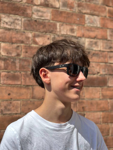 Teenager wearing sunglasses